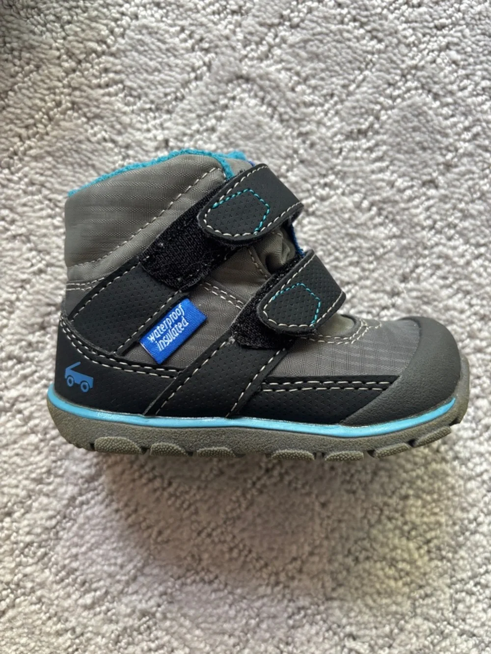 See Kai Run Kids Waterproof Winter Boots in Black with Teal Lining